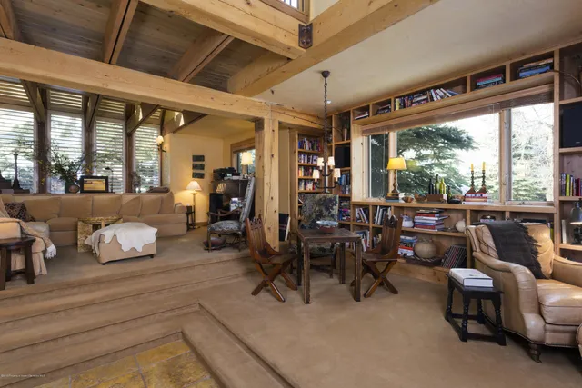a view of a livingroom with furniture window and outside view