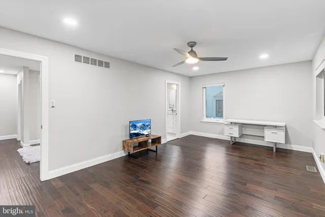 wooden floor that has a window in it