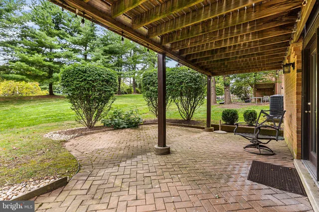 a view of balcony with wooden floor and fence