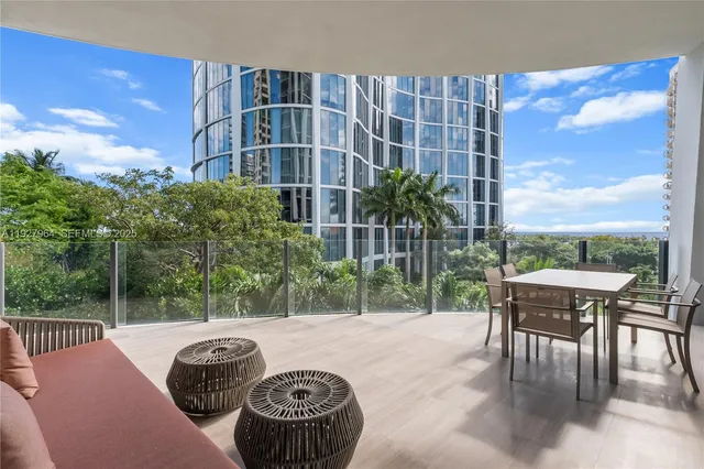 a view of a city with tall buildings