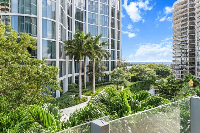 a view of balcony with potted plants