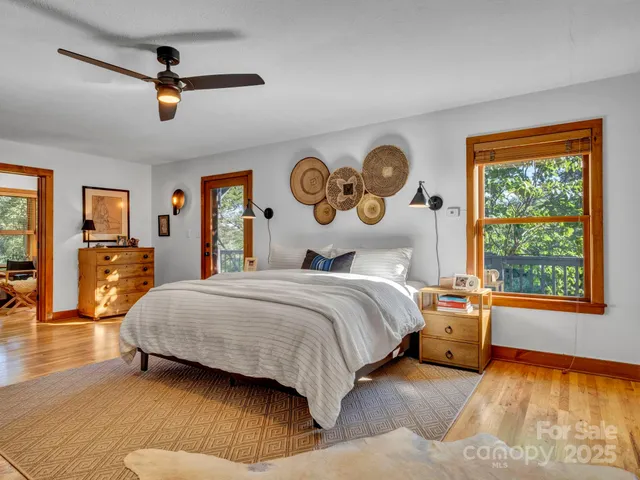 a bedroom with a bed and dresser