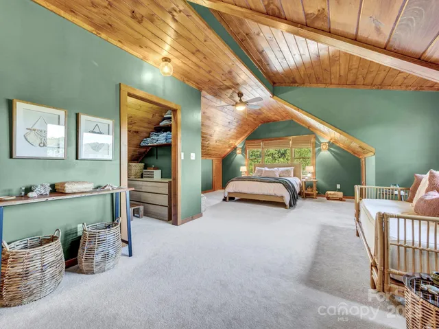 a bathroom with a shower and a toilet