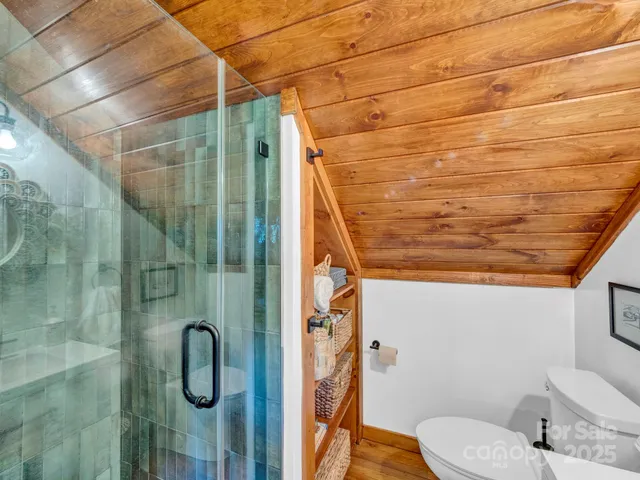 a bathroom with a toilet and a sink