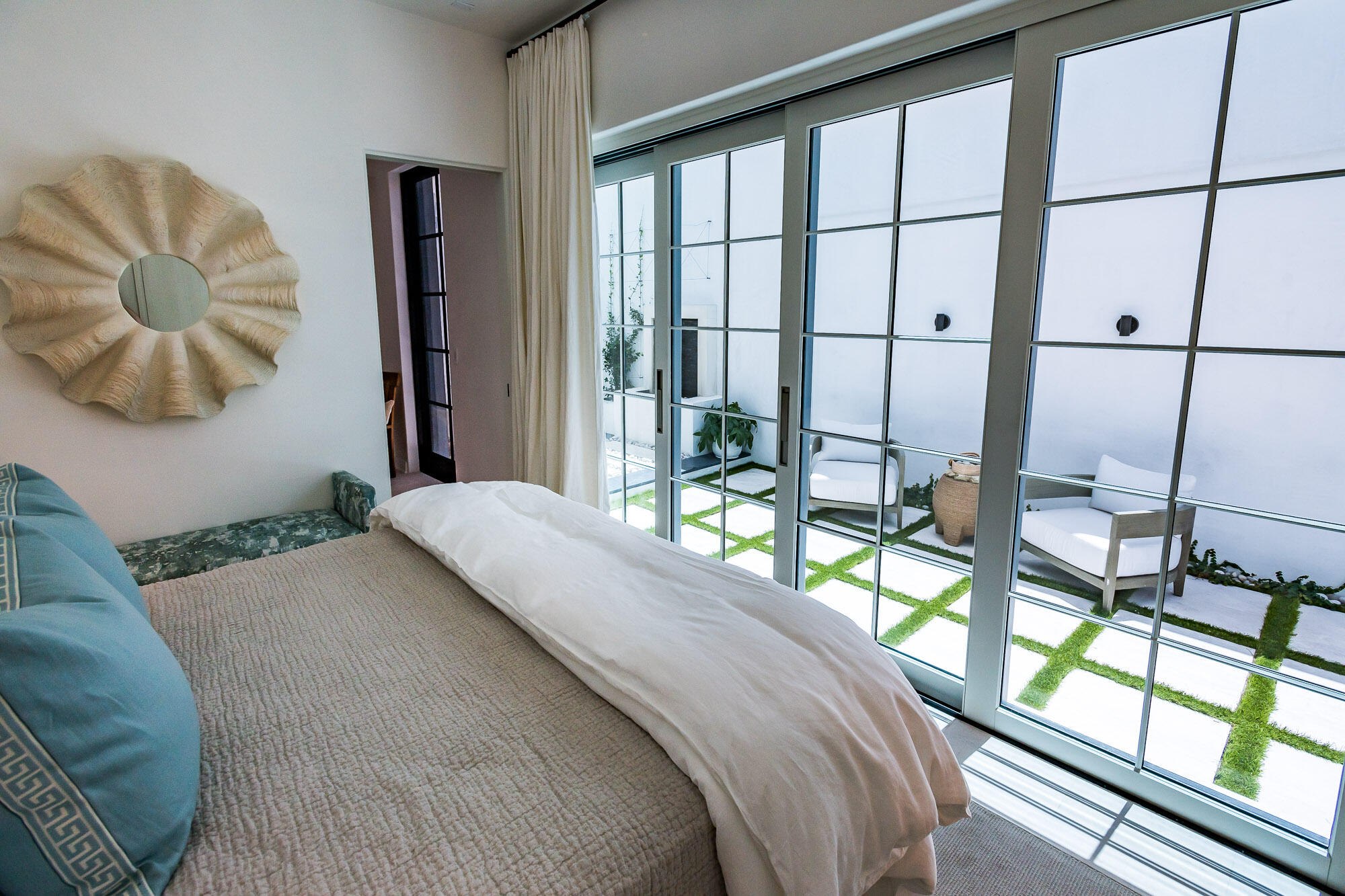 23 Sea Venture Alley, Unit MM6 Inlet Beach, FL 32461 - Photo 17 of 82 a bedroom with a bed and a large window