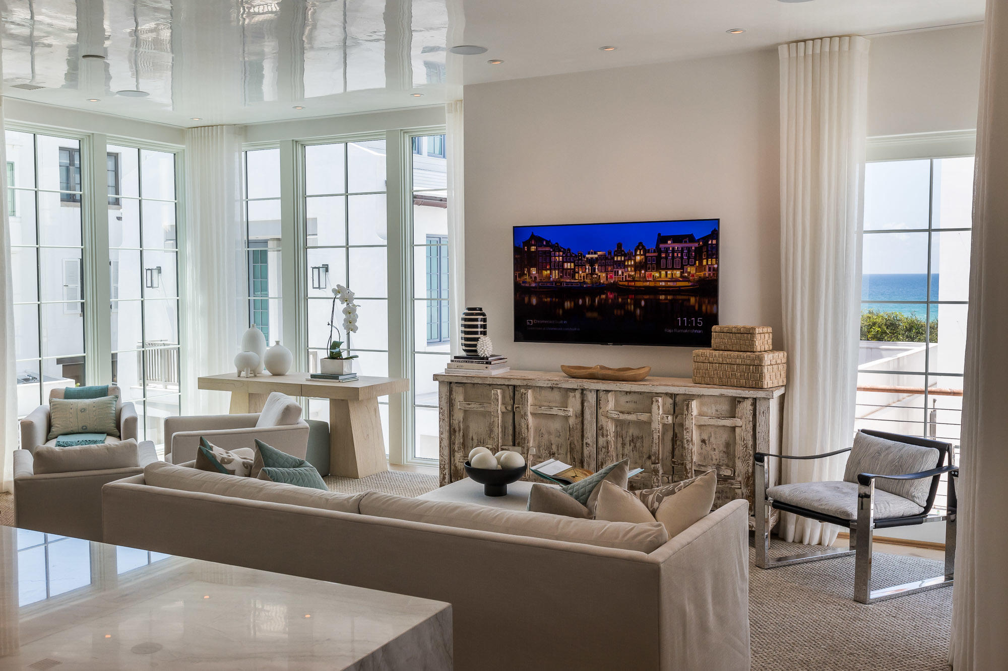 23 Sea Venture Alley, Unit MM6 Inlet Beach, FL 32461 - Photo 28 of 82 a living room with furniture a flat screen tv and a window