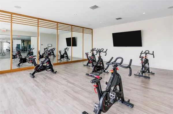 a view of a room with gym equipment