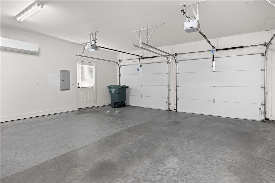 218 Tuttle Street Clemson, SC 29631 - Photo 16 of 20 Clean two car garage with mini split for comfort. Side door goes to fenced in yard.