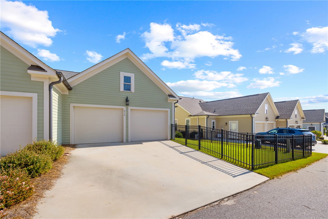 218 Tuttle Street Clemson, SC 29631 - Photo 17 of 20 Back alley entry with driveway room for two more guest cars.