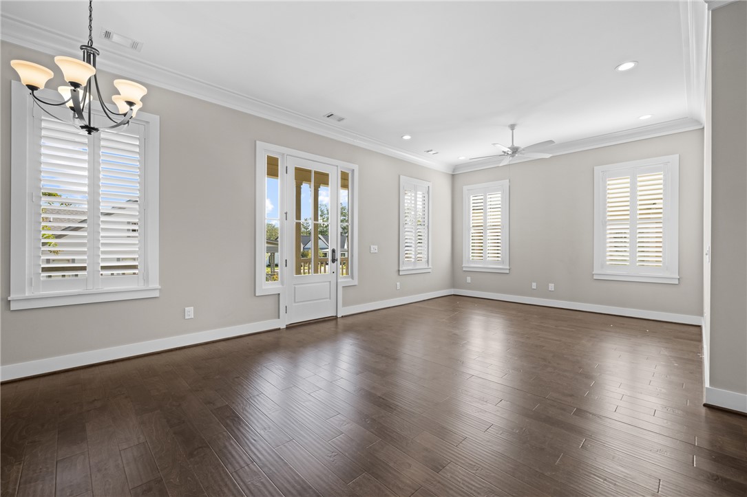 218 Tuttle Street Clemson, SC 29631 - Photo 5 of 20 PLantation shutters in living space windows. Front door leading to porch.
