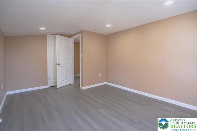 a bathroom with a toilet sink and a window