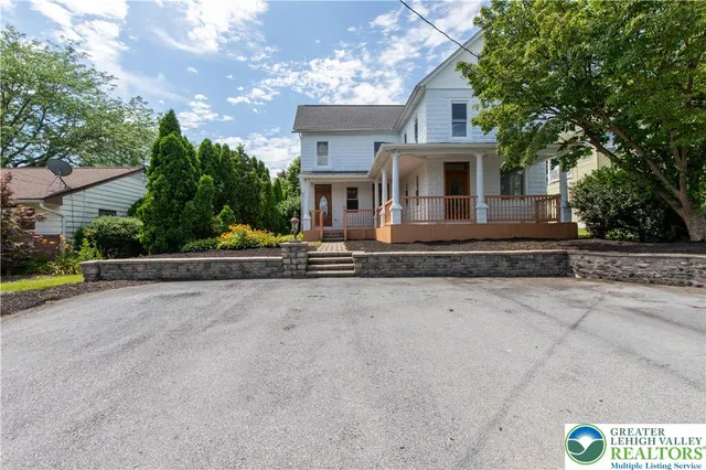 a front view of house with yard