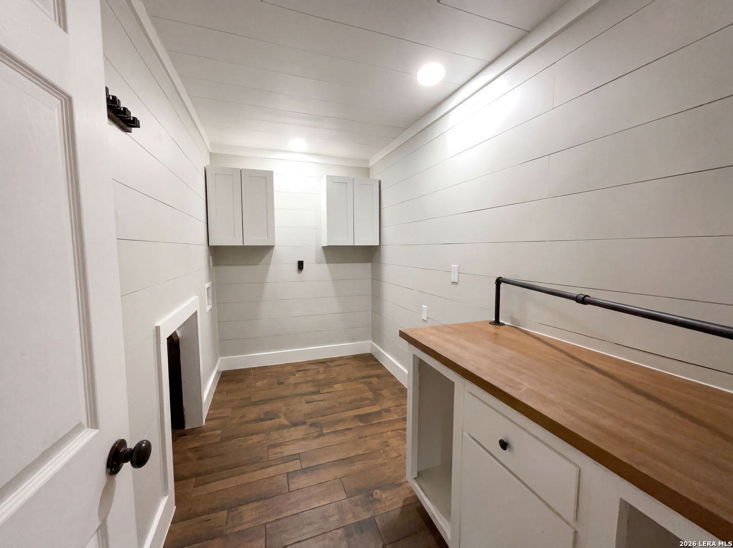 15422 Geronimo Loop San Antonio, TX 78254 - Photo 18 of 21 a kitchen with a sink and a refrigerator