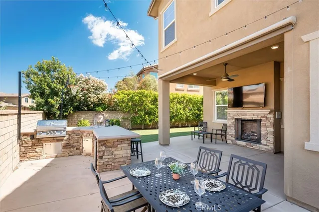 a bathroom with a shower and a sink
