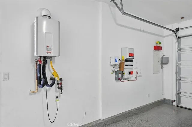 an aerial view of residential houses with outdoor space and river