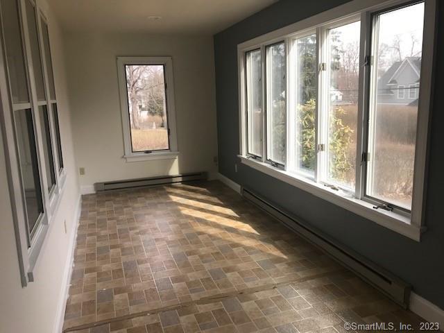 19 Greenfield Avenue Ridgefield, CT 06877 - Photo 2 of 28 a view of an empty room and window