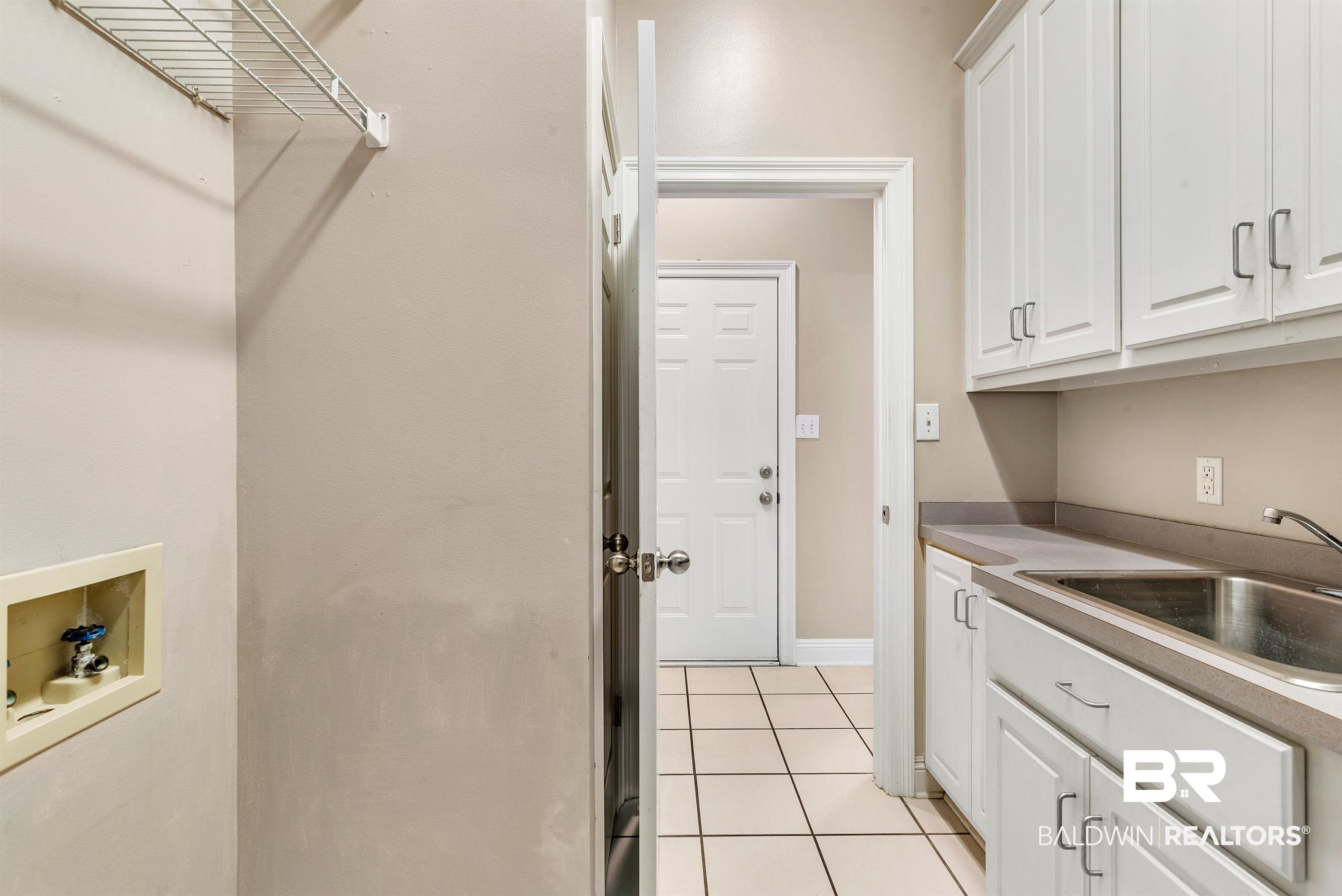 501 Oak Ridge Court West Daphne, AL 36526 - Photo 23 of 50 Laundry Room