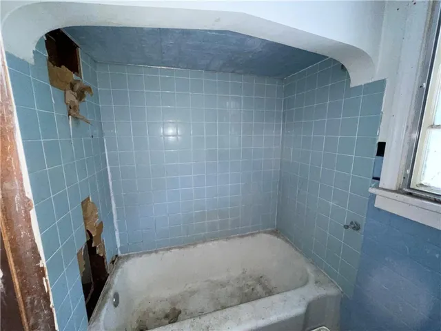 a bathroom with a bathtub