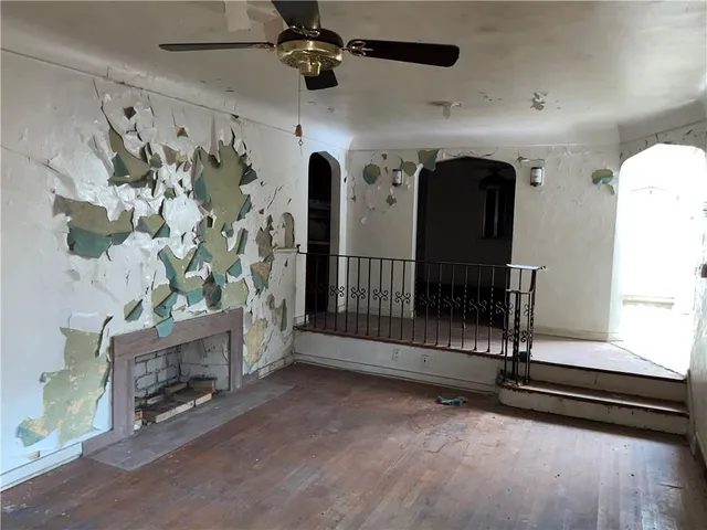 a view of entryway with wooden floor