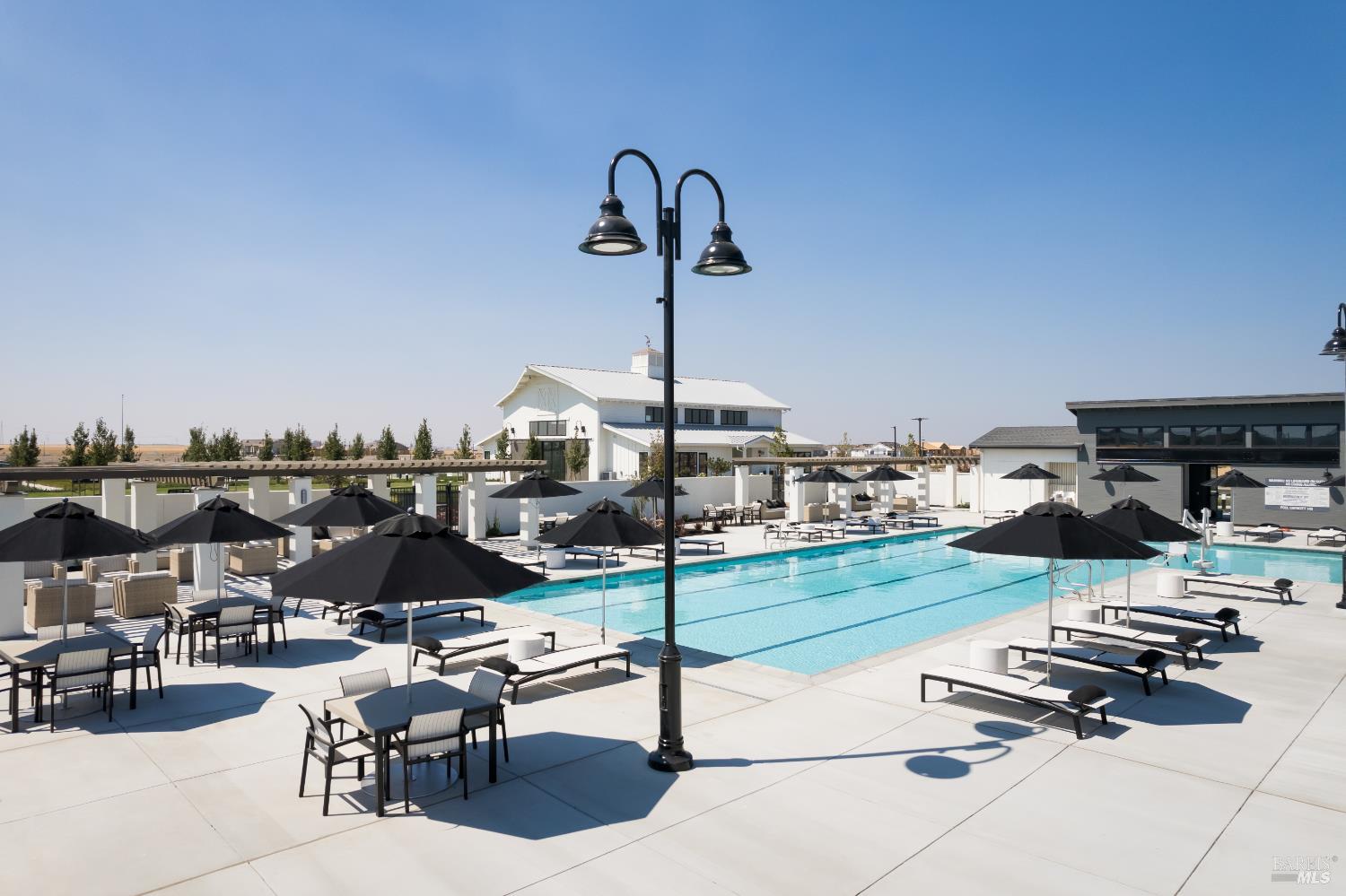 2261 Espana Lane Rio Vista, CA 94571 - Photo 22 of 23 a view of a patio with chairs and umbrellas on a road