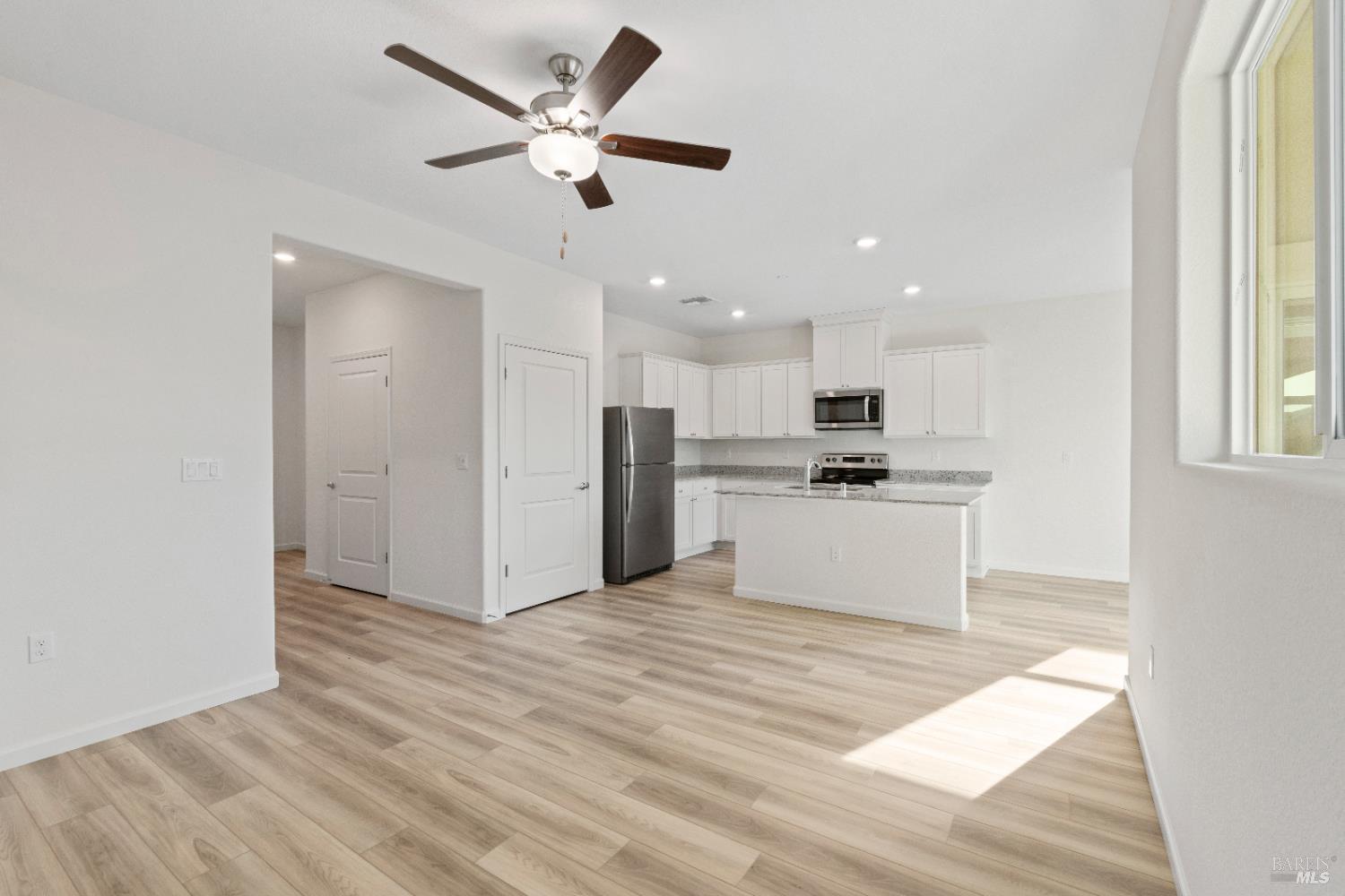 2261 Espana Lane Rio Vista, CA 94571 - Photo 5 of 23 a view of kitchen with granite countertop cabinets and refrigerator