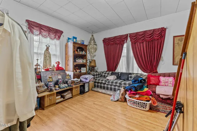 a room with lots of stuff and a table