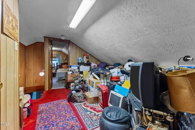 a room with furniture and a wooden floor