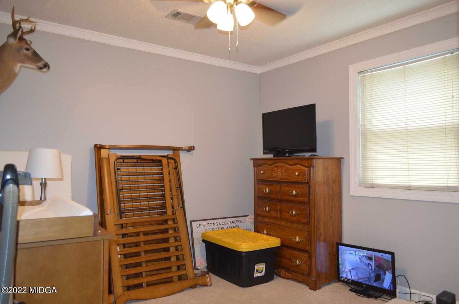 5760 Sardis Church Road Macon, GA 31216 - Photo 15 of 21 a living room with furniture and a flat screen tv