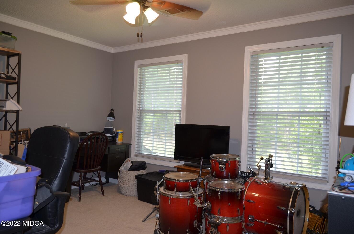 5760 Sardis Church Road Macon, GA 31216 - Photo 16 of 21 a view of a livingroom with furniture and a window