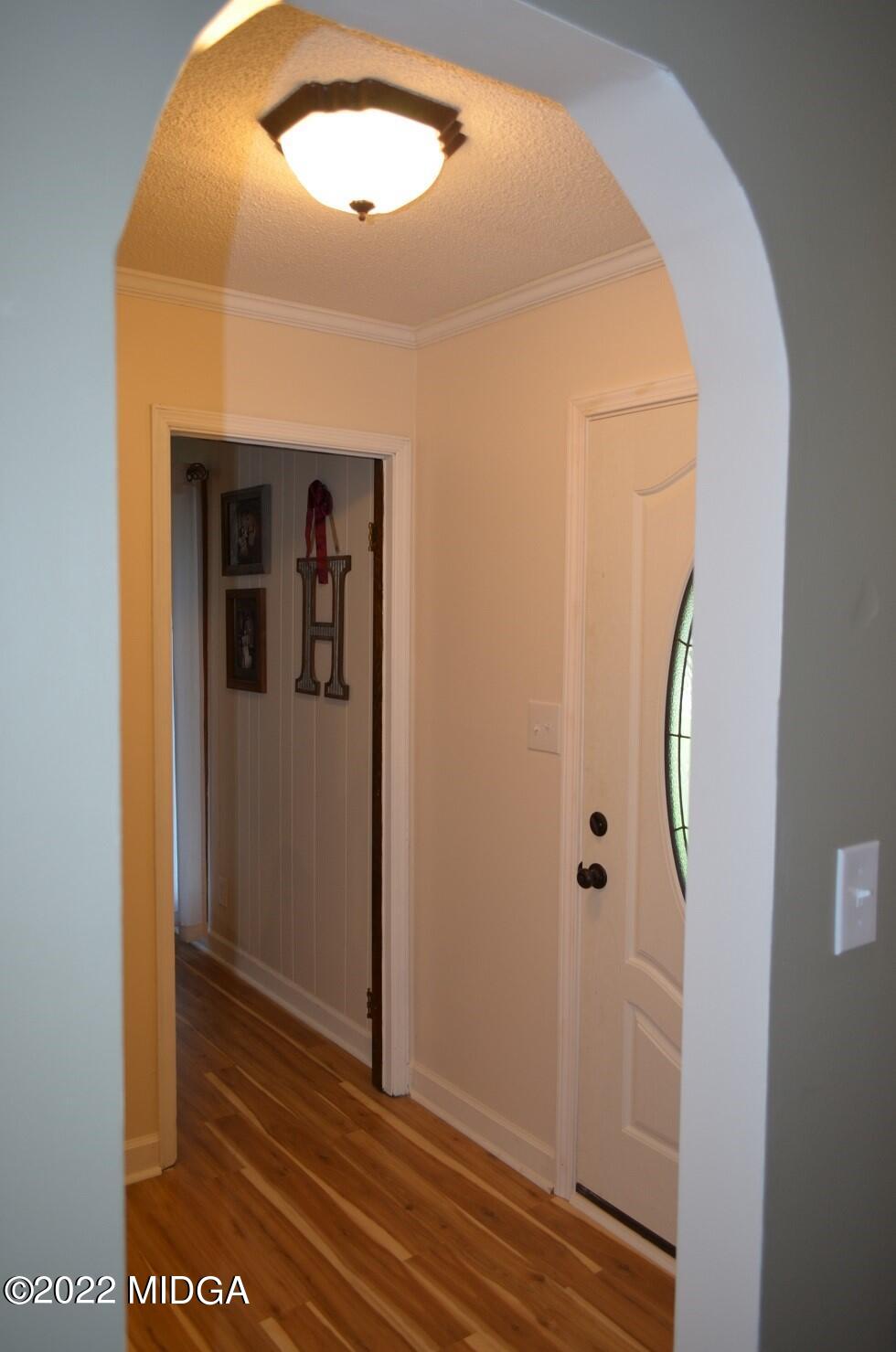 5760 Sardis Church Road Macon, GA 31216 - Photo 3 of 21 a view of a hallway with wooden floor and entryway