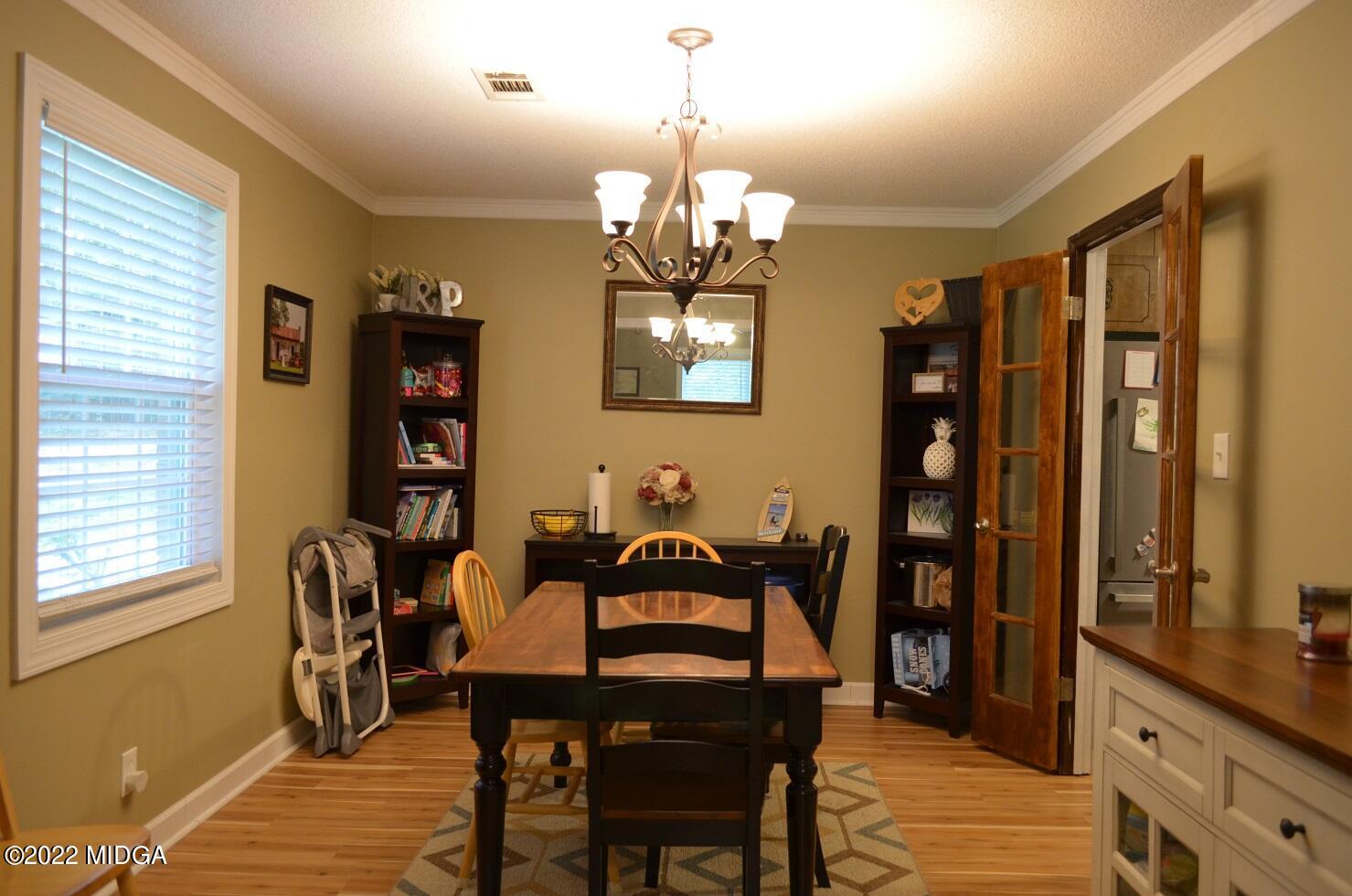 5760 Sardis Church Road Macon, GA 31216 - Photo 5 of 21 a view of a dining room with furniture and window