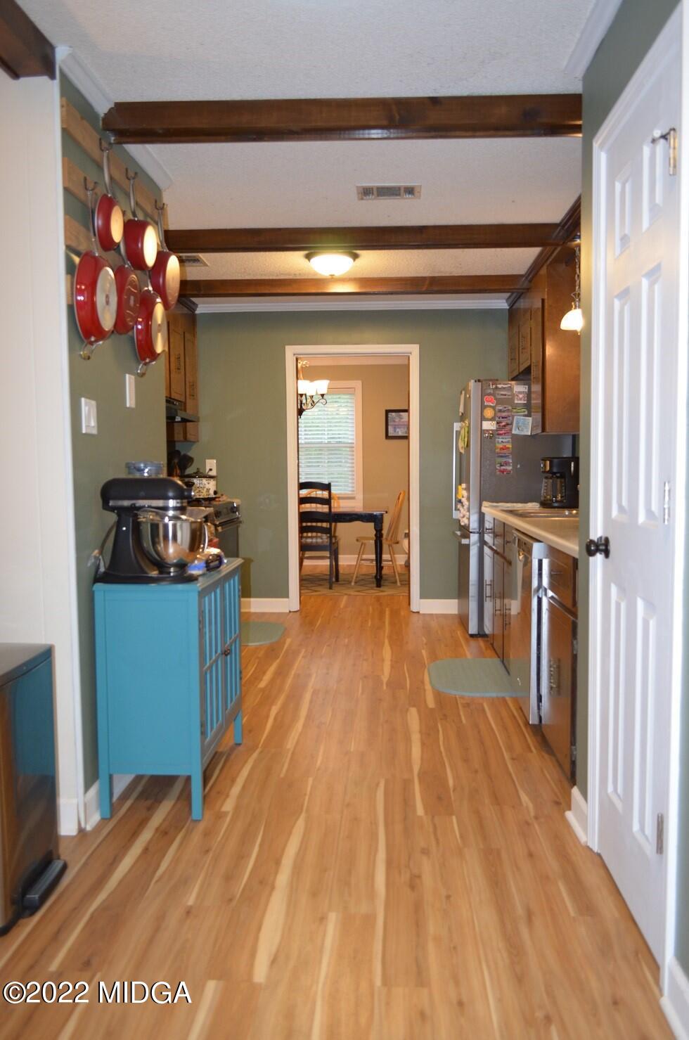 5760 Sardis Church Road Macon, GA 31216 - Photo 6 of 21 a view of a kitchen and dining room