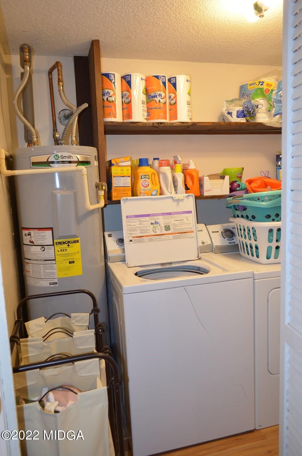 5760 Sardis Church Road Macon, GA 31216 - Photo 8 of 21 a utility room with dryer and washer
