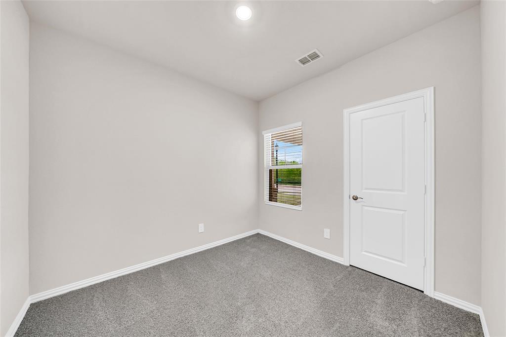 417 Martell Road Lowry Crossing, TX 75069 - Photo 22 of 29 an empty room with windows