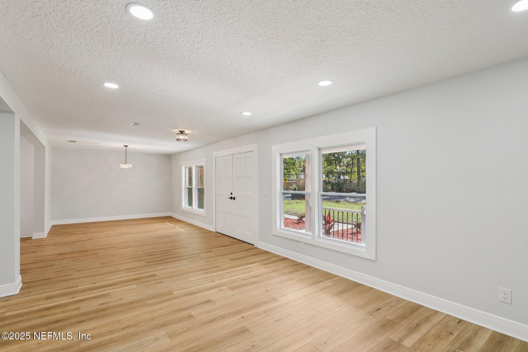 12305 Del Rio Drive Jacksonville, FL 32258 - Photo 16 of 75 Living Room to Dining Room
