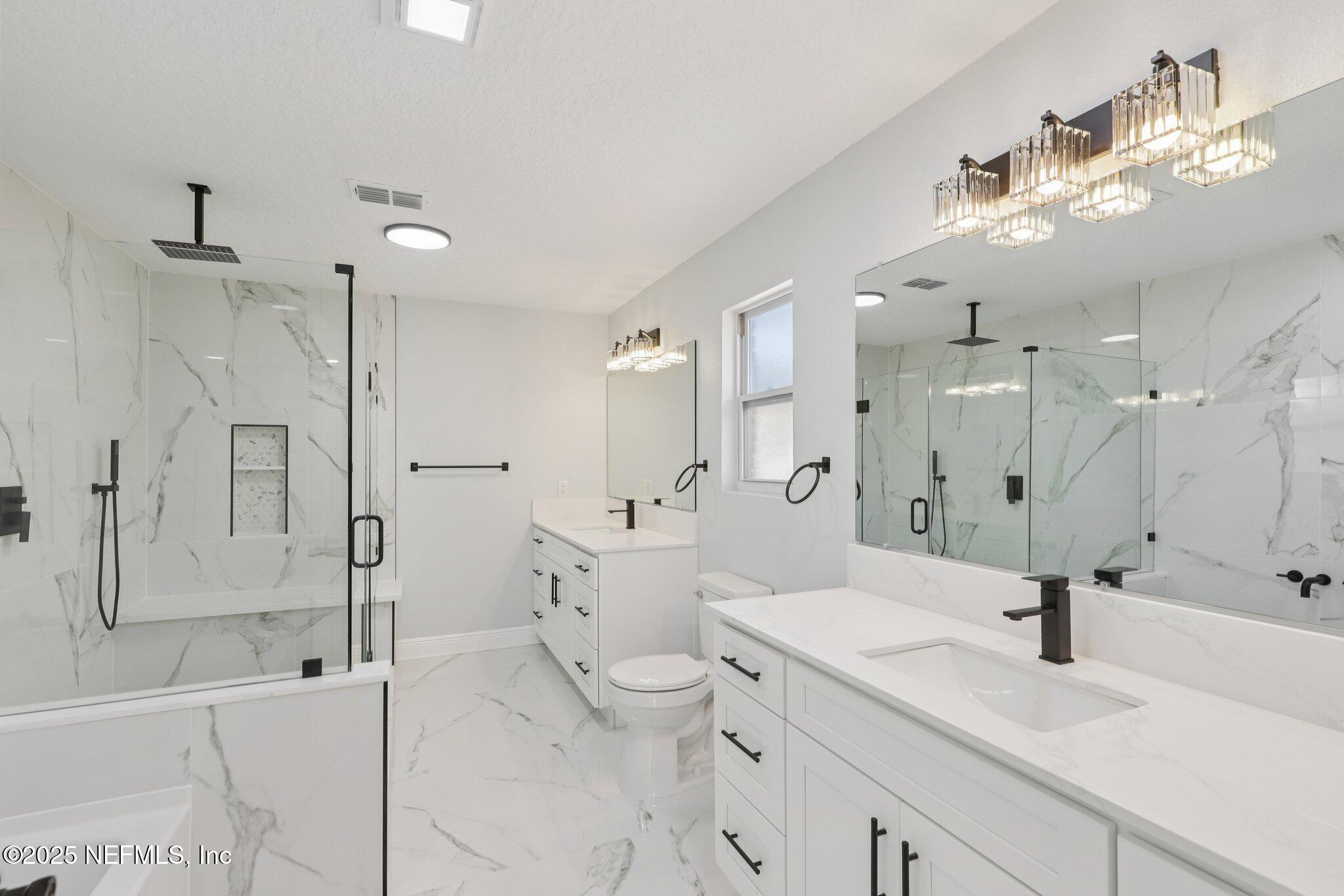 12305 Del Rio Drive Jacksonville, FL 32258 - Photo 31 of 75 Primary Ensuite Bath w/2 Full Vanities