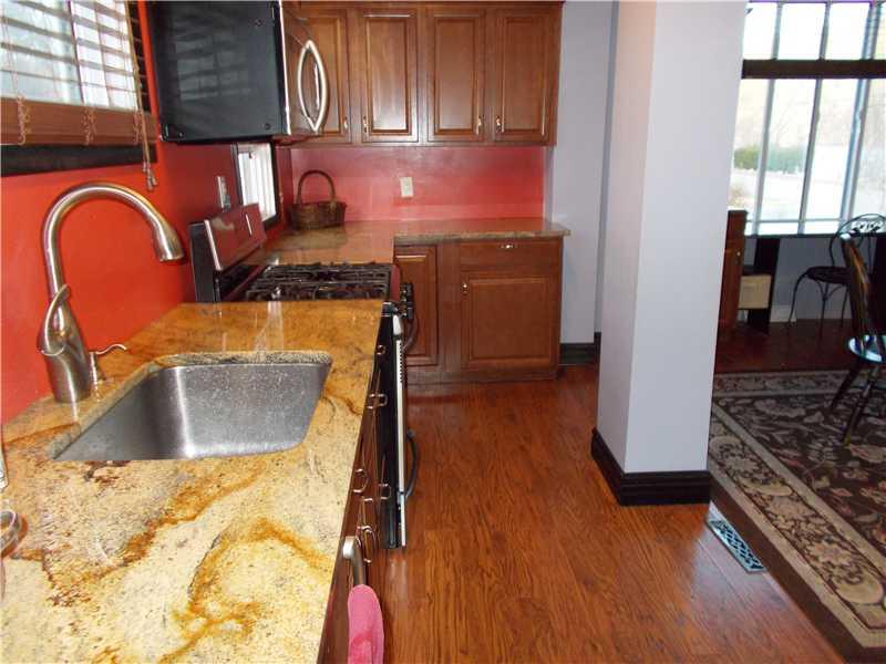 15 Riverside Drive Freeport, PA 16229 - Photo 11 of 25 Kitchen. Beautiful granite counter tops an extra deep sink and a sprayer faucet. What more could you need for those big family meals!!