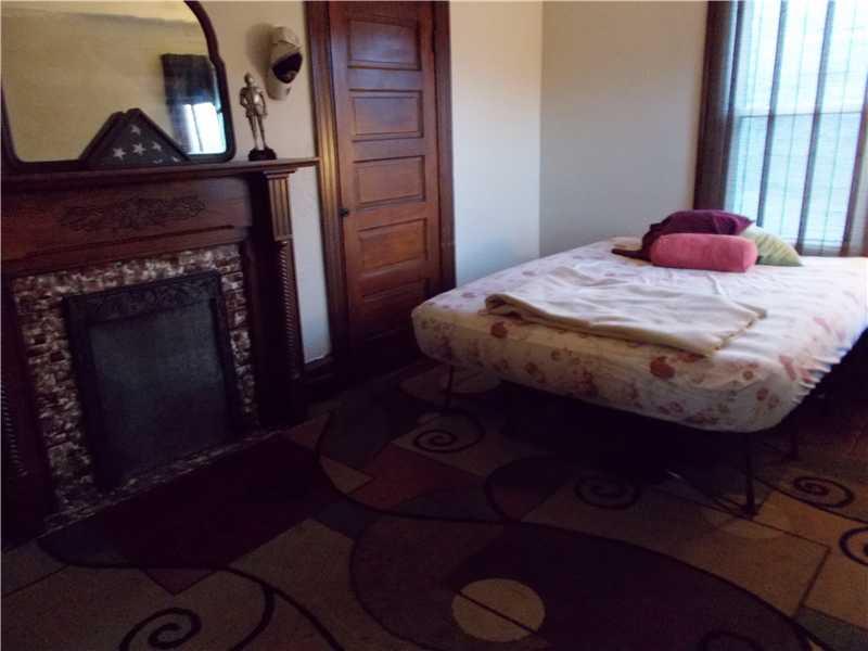 15 Riverside Drive Freeport, PA 16229 - Photo 19 of 25 Bedroom. The 3rd bedroom boasts 2 closets and a decorative fireplace.