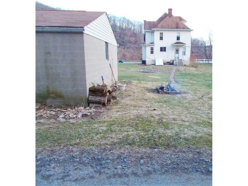 15 Riverside Drive Freeport, PA 16229 - Photo 25 of 25 Exterior Back. After the baseball game, roast some hot dogs & marshmallows on the fire. Lots of room for entertaining!