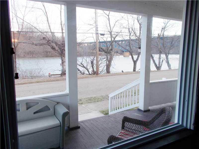 15 Riverside Drive Freeport, PA 16229 - Photo 8 of 25 View. The view of the river can be seen from the kitchen through this picture window in the living room.