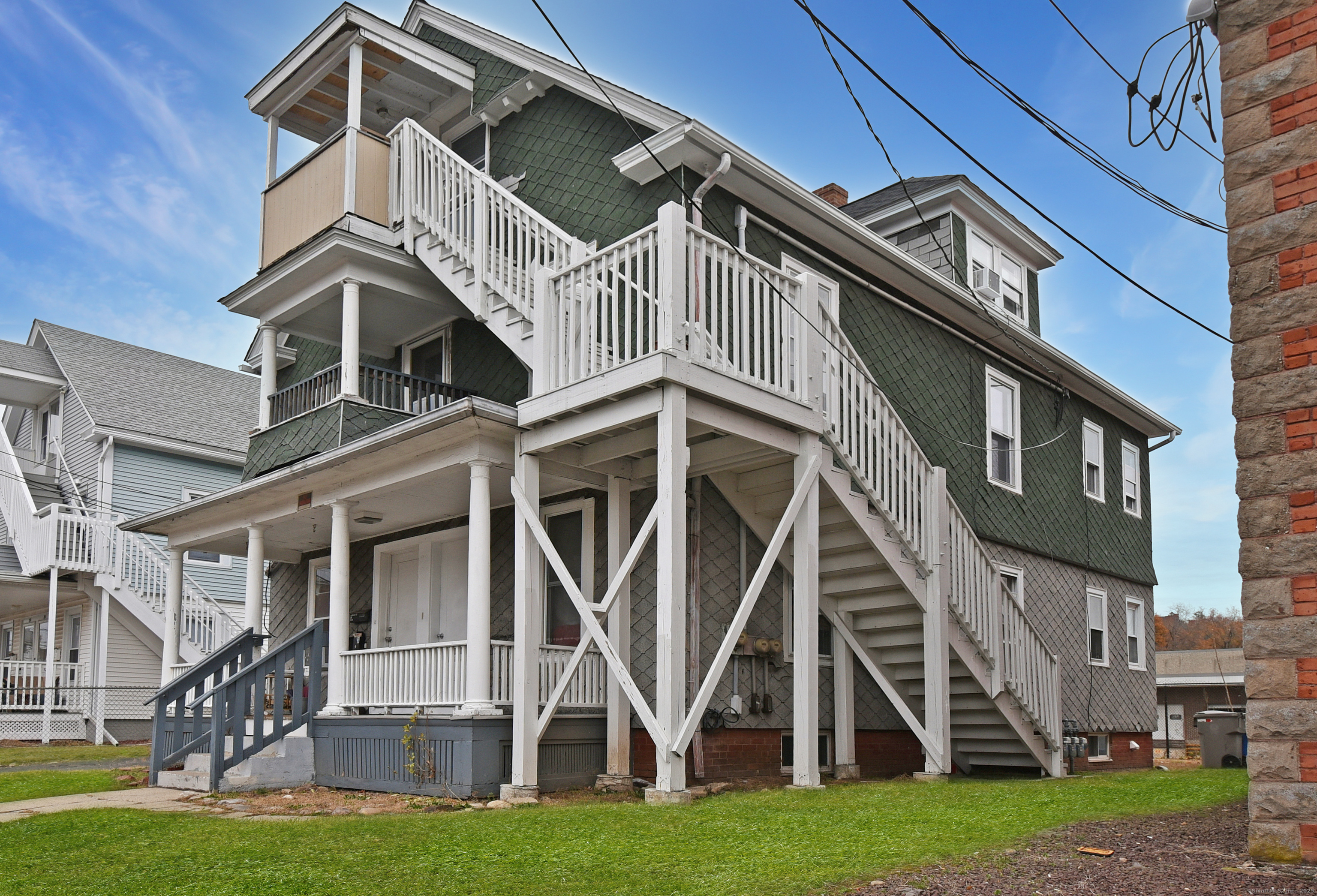 22 Kelley Street Bristol, CT 06010 - Photo 2 of 19 a front view of a house with a yard