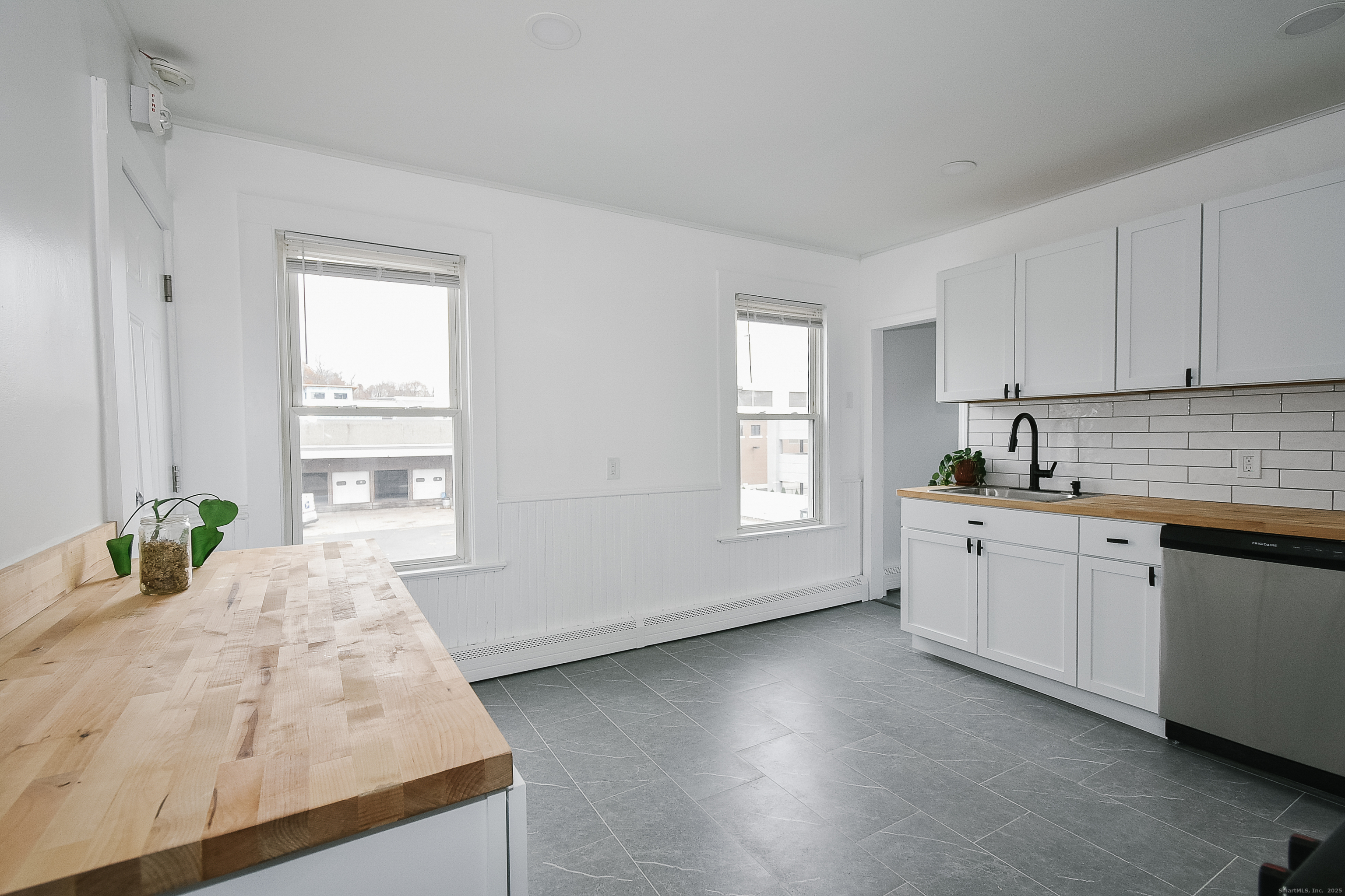 22 Kelley Street Bristol, CT 06010 - Photo 3 of 19 a kitchen with sink and window