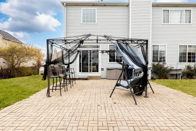 a view of a house with a patio