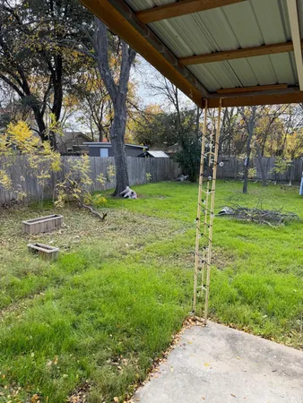 a backyard of a house with lots of green space