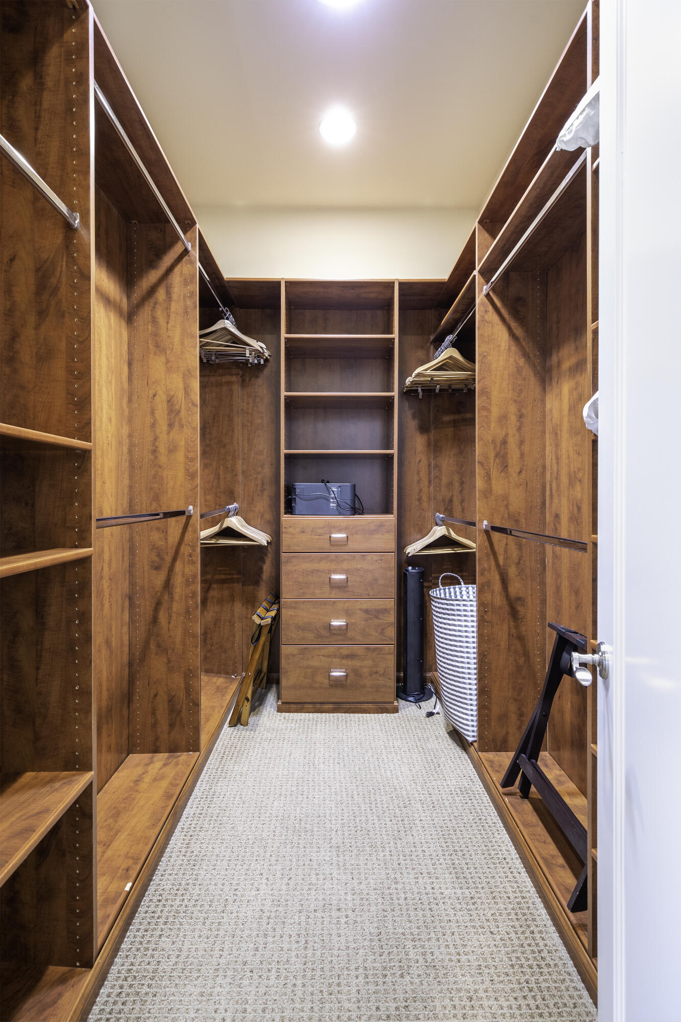 72737 Verbenia Road Rancho Mirage, CA 92270 - Photo 20 of 29 a view of walk in closet with clothes and shoes