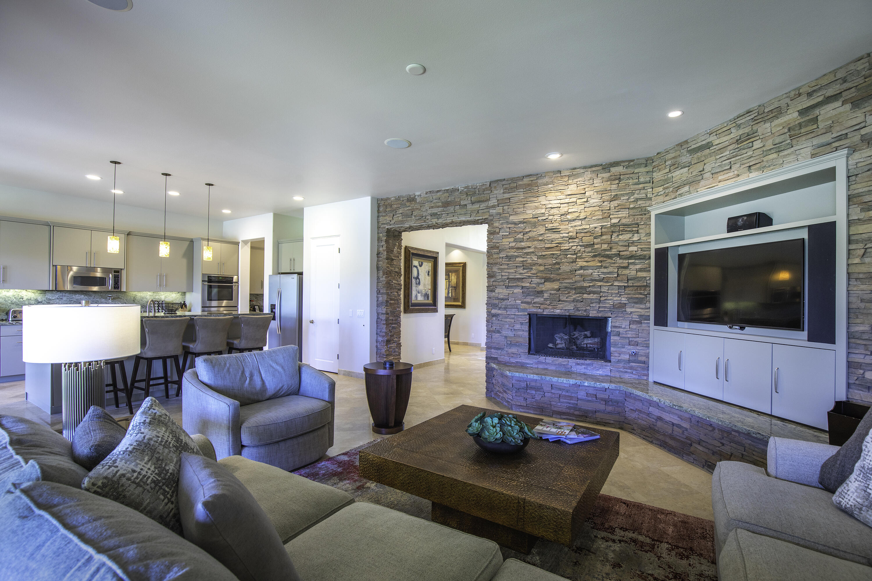 72737 Verbenia Road Rancho Mirage, CA 92270 - Photo 10 of 29 a living room with furniture and a flat screen tv