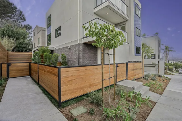 a view of a two chairs in the patio