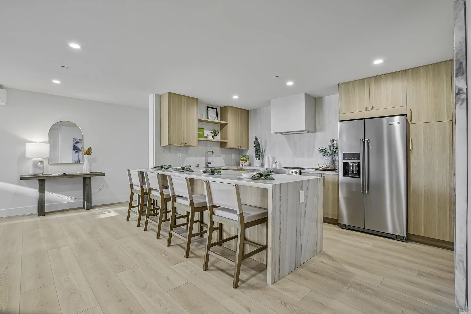 2126 San Clemente Street San Diego, CA 92107 - Photo 7 of 20 a kitchen with kitchen island granite countertop a sink cabinets and stainless steel appliances