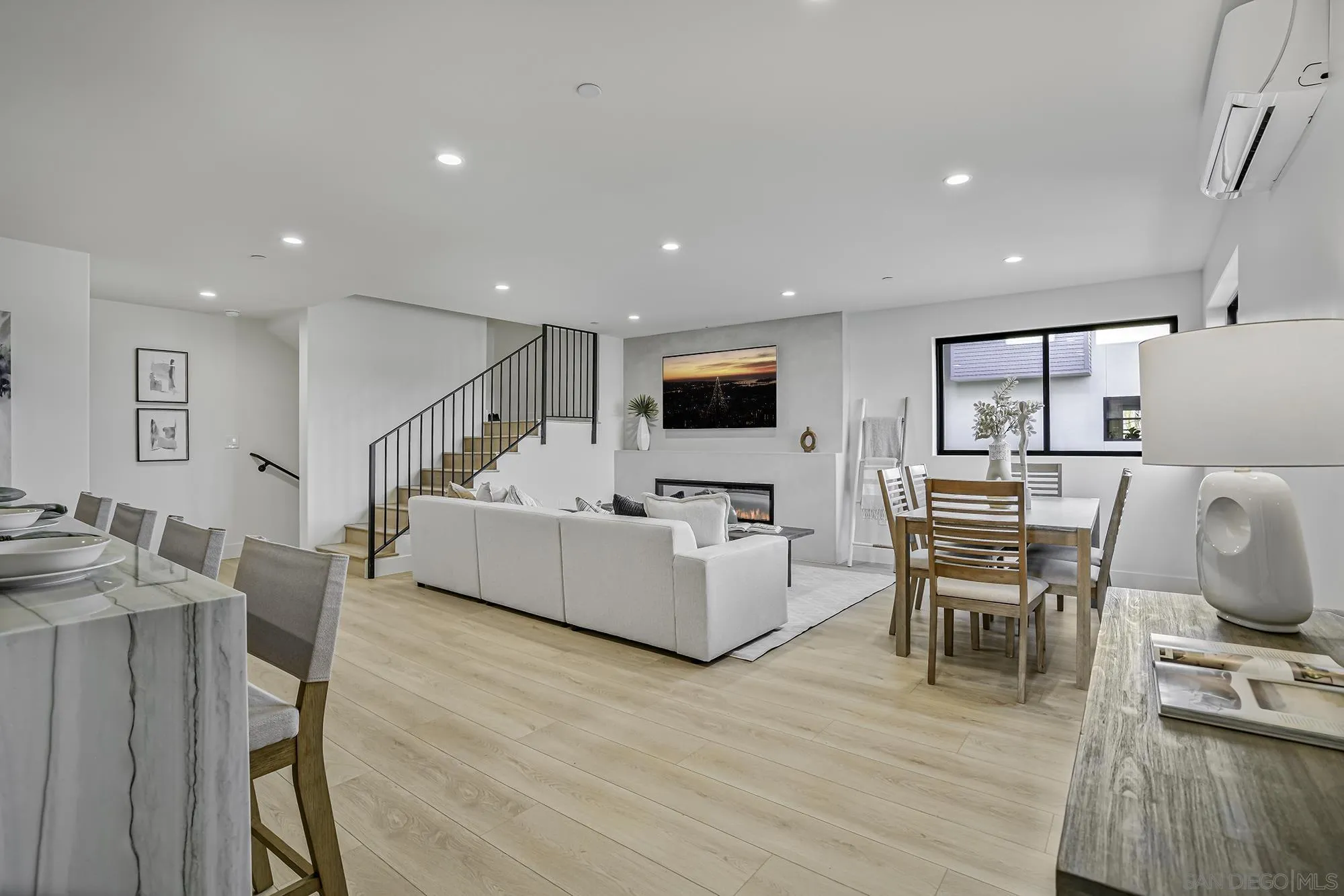 2126 San Clemente Street San Diego, CA 92107 - Photo 10 of 20 a living room with furniture and a wooden floor