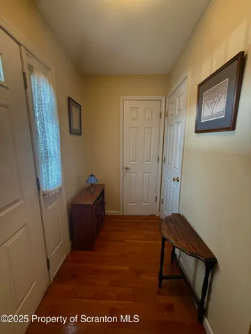 a view of room with window and furniture